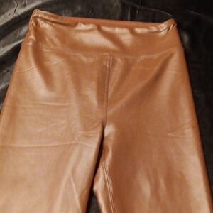 Tan leather like leggings.